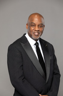 Lawrence C. Glass Jr., formal portrait in tuxedo